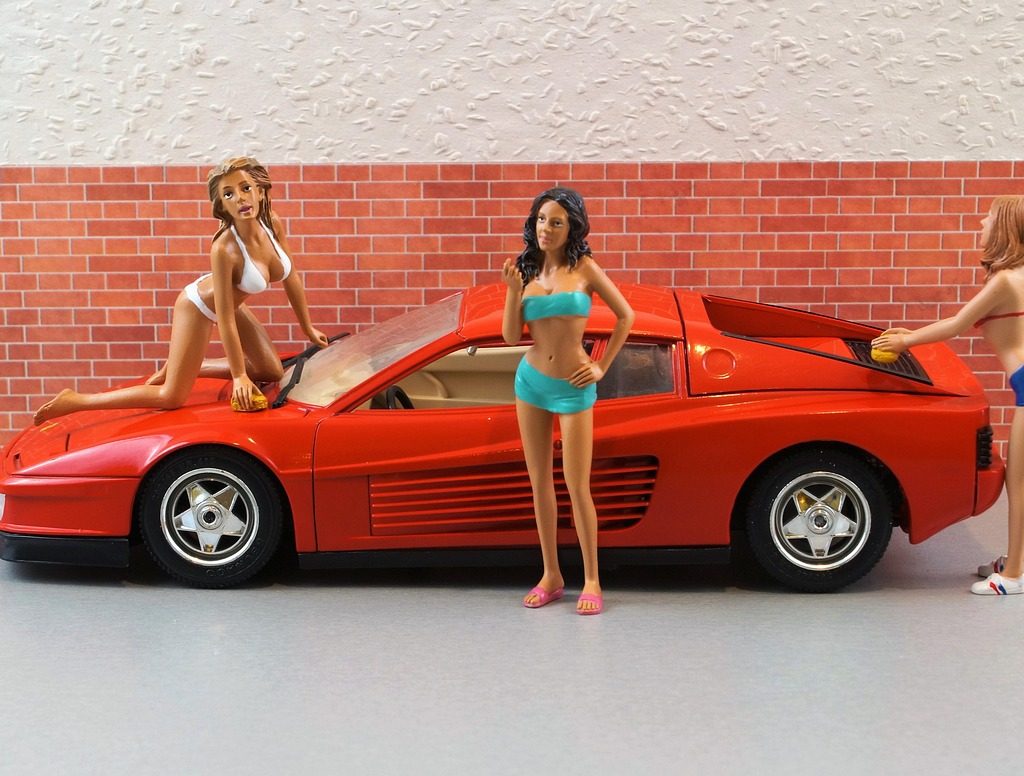 model car, ferrari, model, diorama, automobile, antique car, toy, sports car, old, testarossa, motorsport, vehicle, classic, engine, engine hood, automotive doll, carwash, bikini, car wash